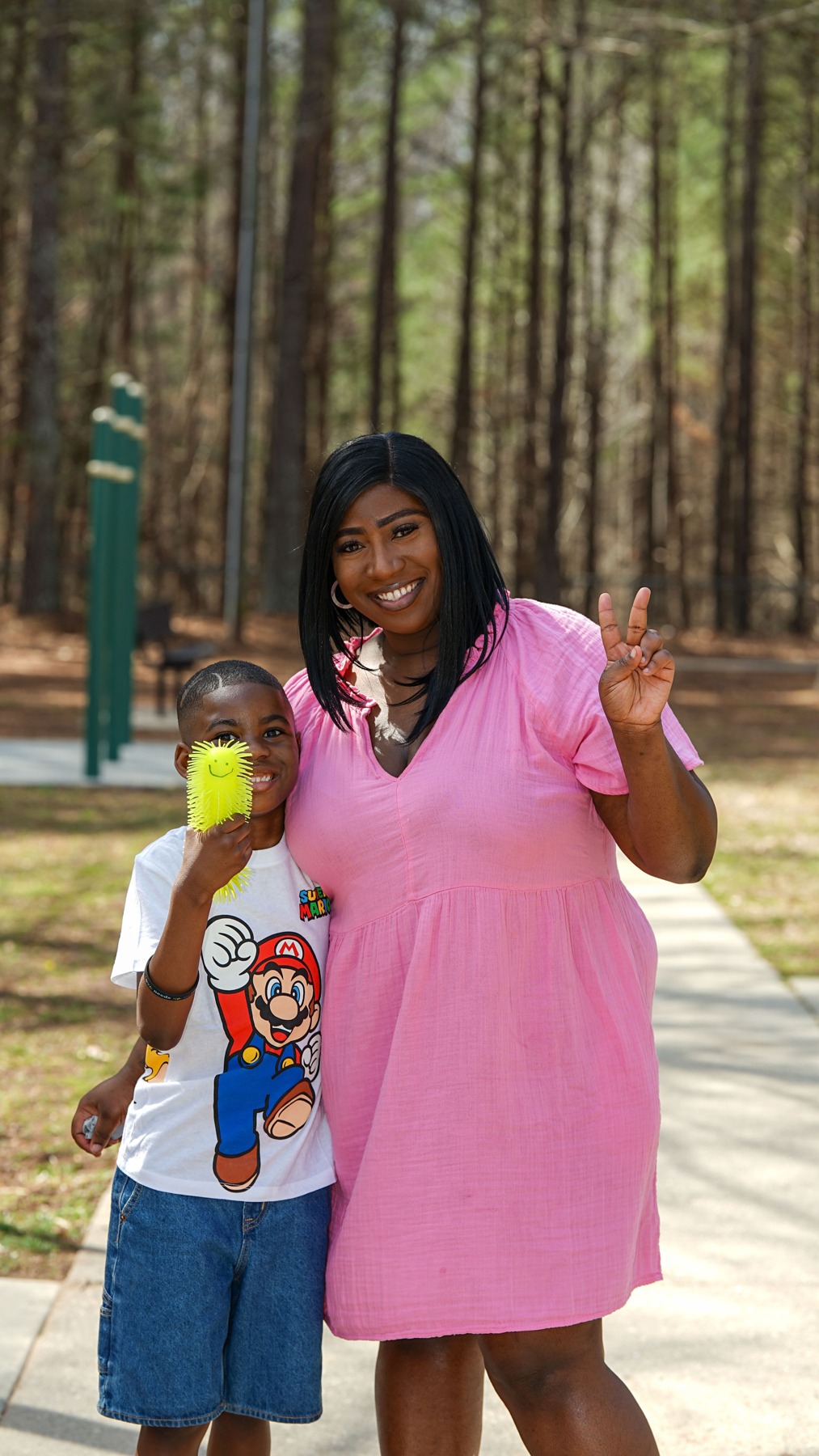 An adult and child in a community photograph on Tyler’s Way Foundation’s About page